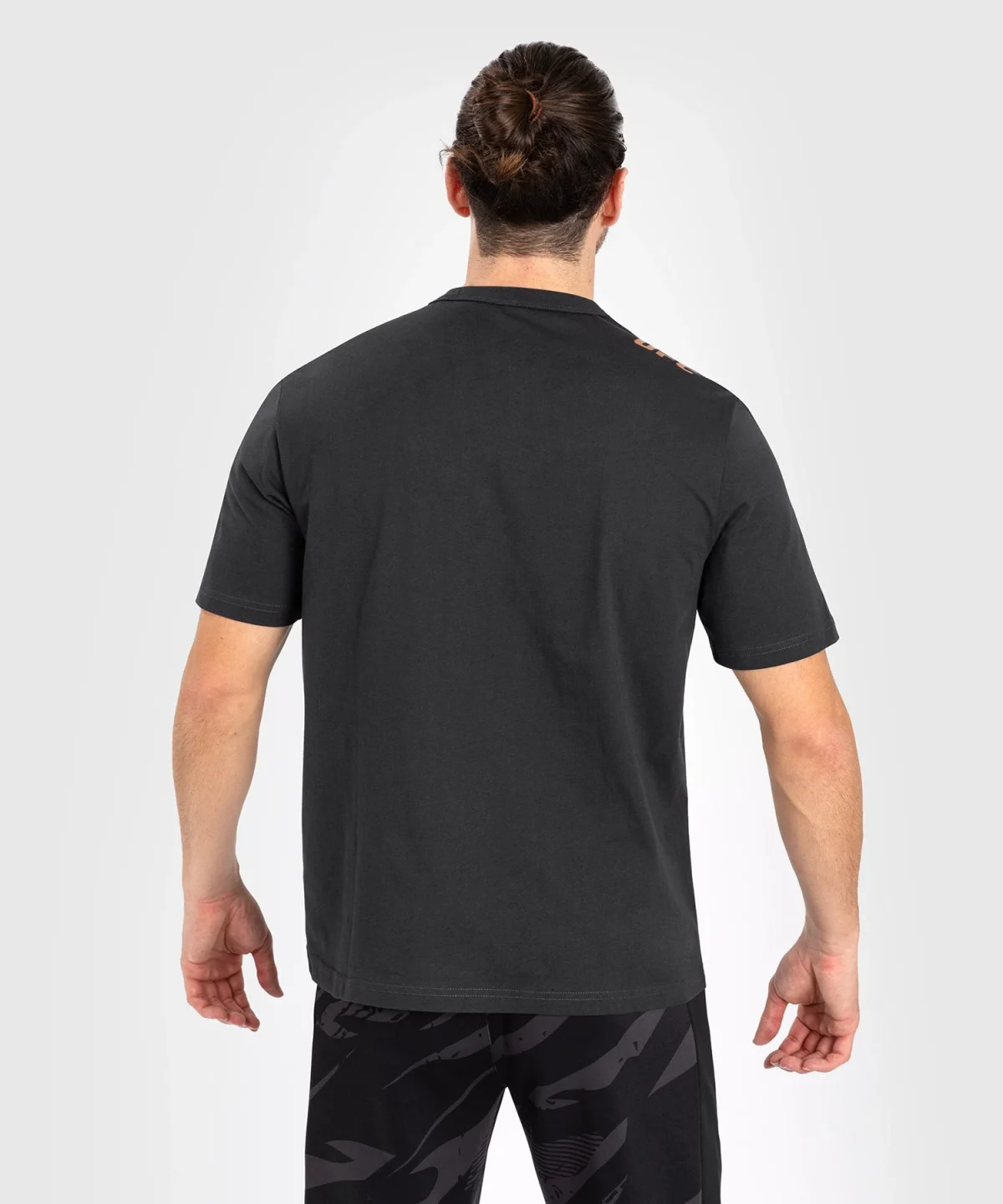 3adfed2d399d87511a79227d7028d12688b09ae2_TS_UFC_FW_ADRENALINE_BLACK_BRONZE_B_ccf0ba0b-ac6e-4438-a59a-1ffa272e9f10 UFC Adrenaline by Venum Fight Week Men’s Short Sleeve T-shirt - Charcoal Grey - Image 4
