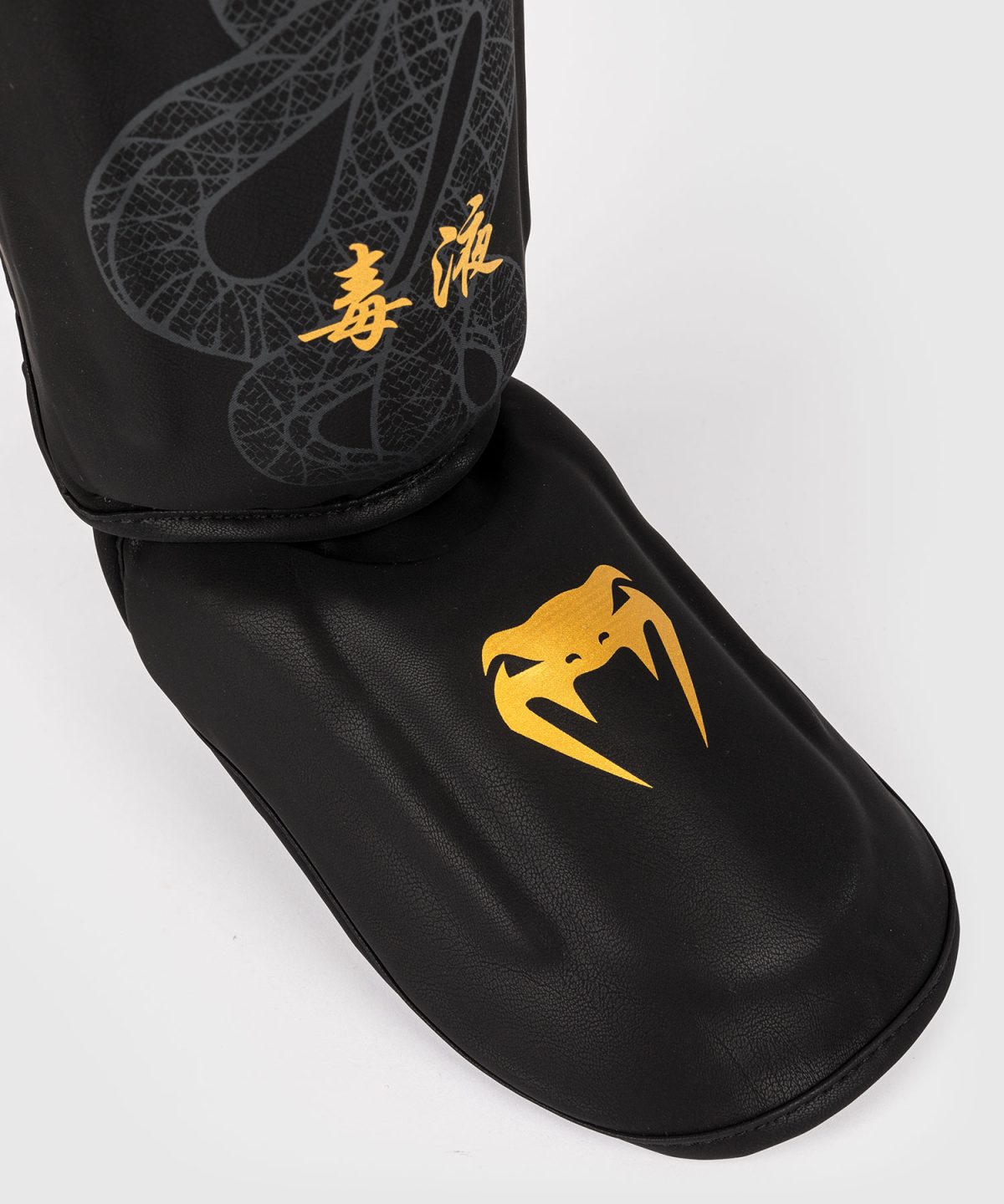 Venum Serpenti Shin Guards - Black/Silver/Gold - Image 3