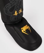 Venum Serpenti Shin Guards - Black/Silver/Gold - Image 3