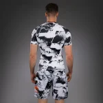 UFC Zenith by Venum Authentic Fight Week Men's White Performance Short Sleeve Rashguard - Image 3