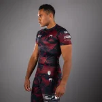 UFC Zenith by Venum Authentic Fight Week Men's White Performance Short Sleeve Rashguard - Image 2